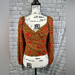 ASTR shirred long sleeve smocked top. Leopard and Poppies. Women’s size SMALL.